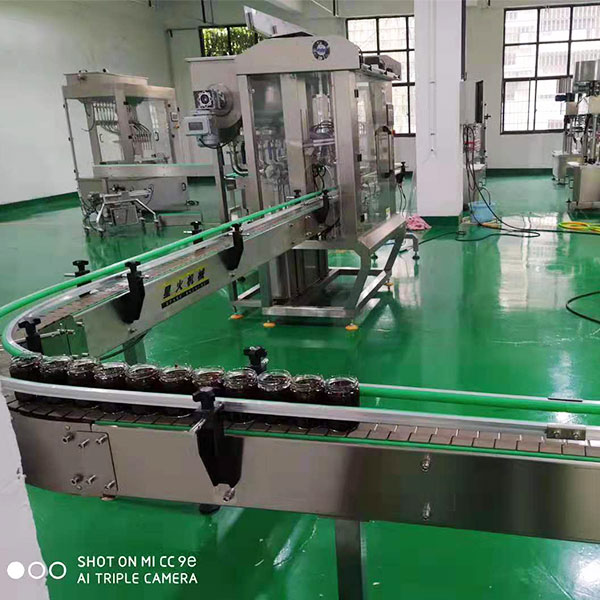 芝麻醬灌裝真空封口機(jī)流水線